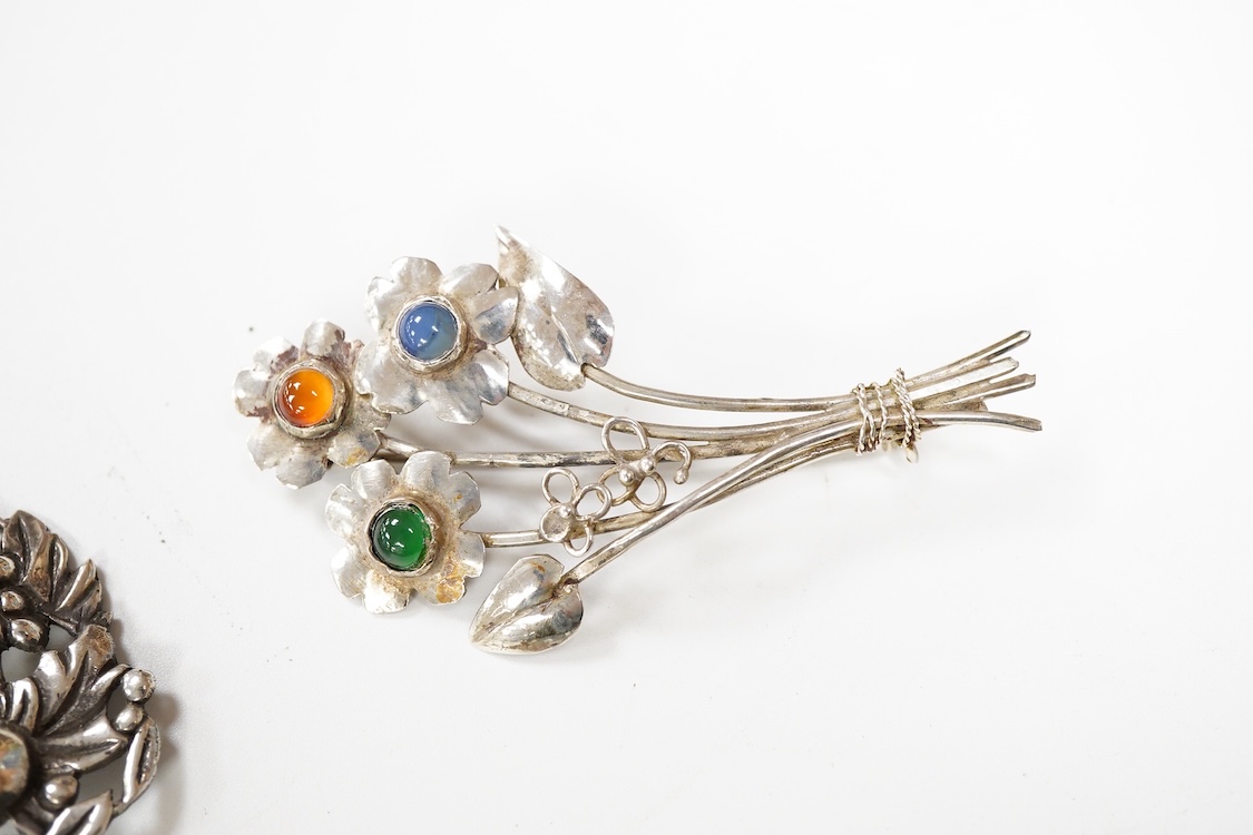 An 800 standard gilt white metal and garnet cluster set oval pendant, 18mm, on a 585 yellow metal fine link chain, 2.5 grams, a gilt white metal and garnet cluster set hinged bangle, two white metal brooches including on